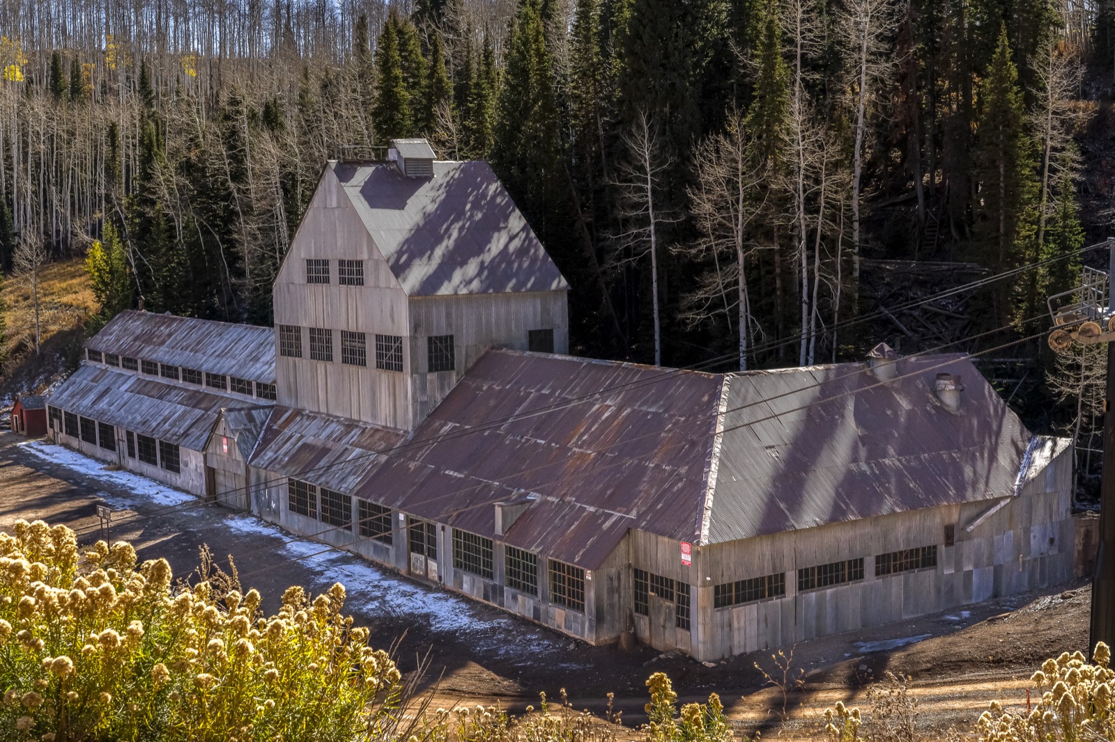 The fully restored Silver King Mine complex in October 2025, with repaired roofing and new windows